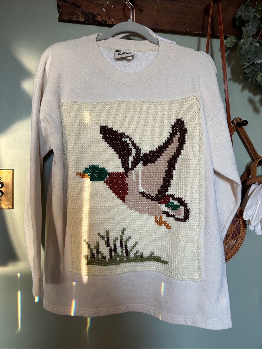 Cream Crewneck Sweater with Duck Appliqué
